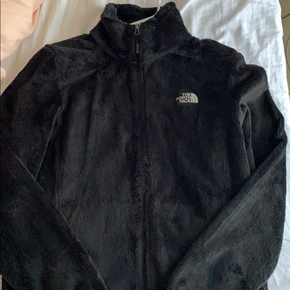 Black fuzzy north face jacket